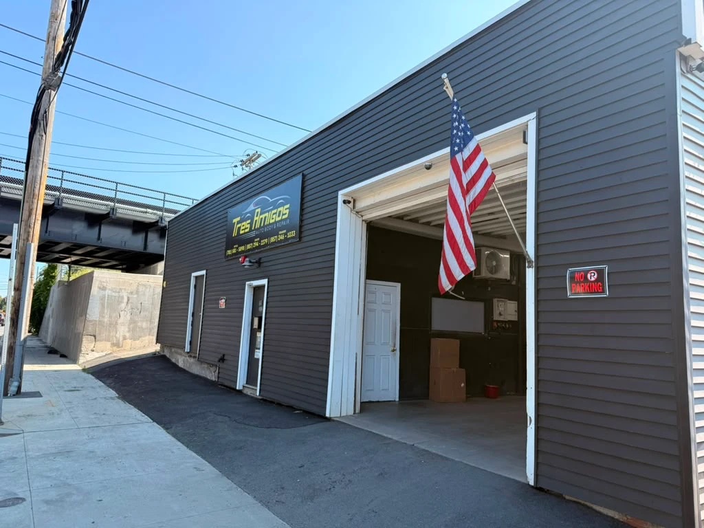 Tres Amigos Auto Body storefront on Commercial St, Lynn